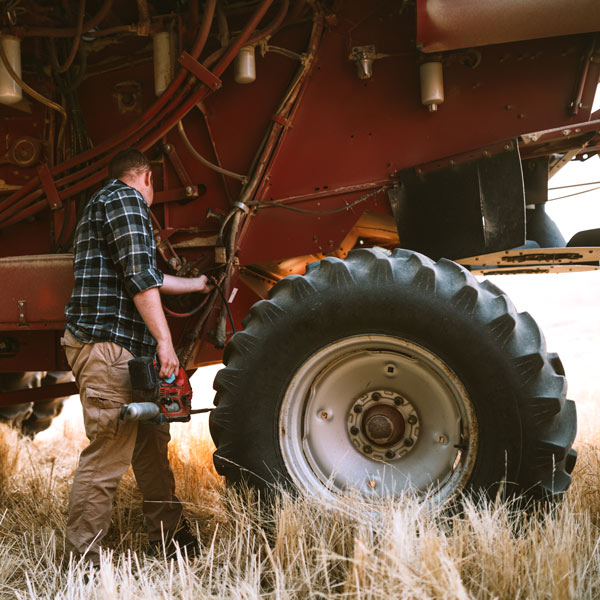 Tractor repairing on a field